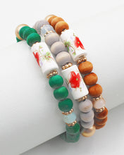 Load image into Gallery viewer, Wood Beaded Bracelet with Ceramic Accent

